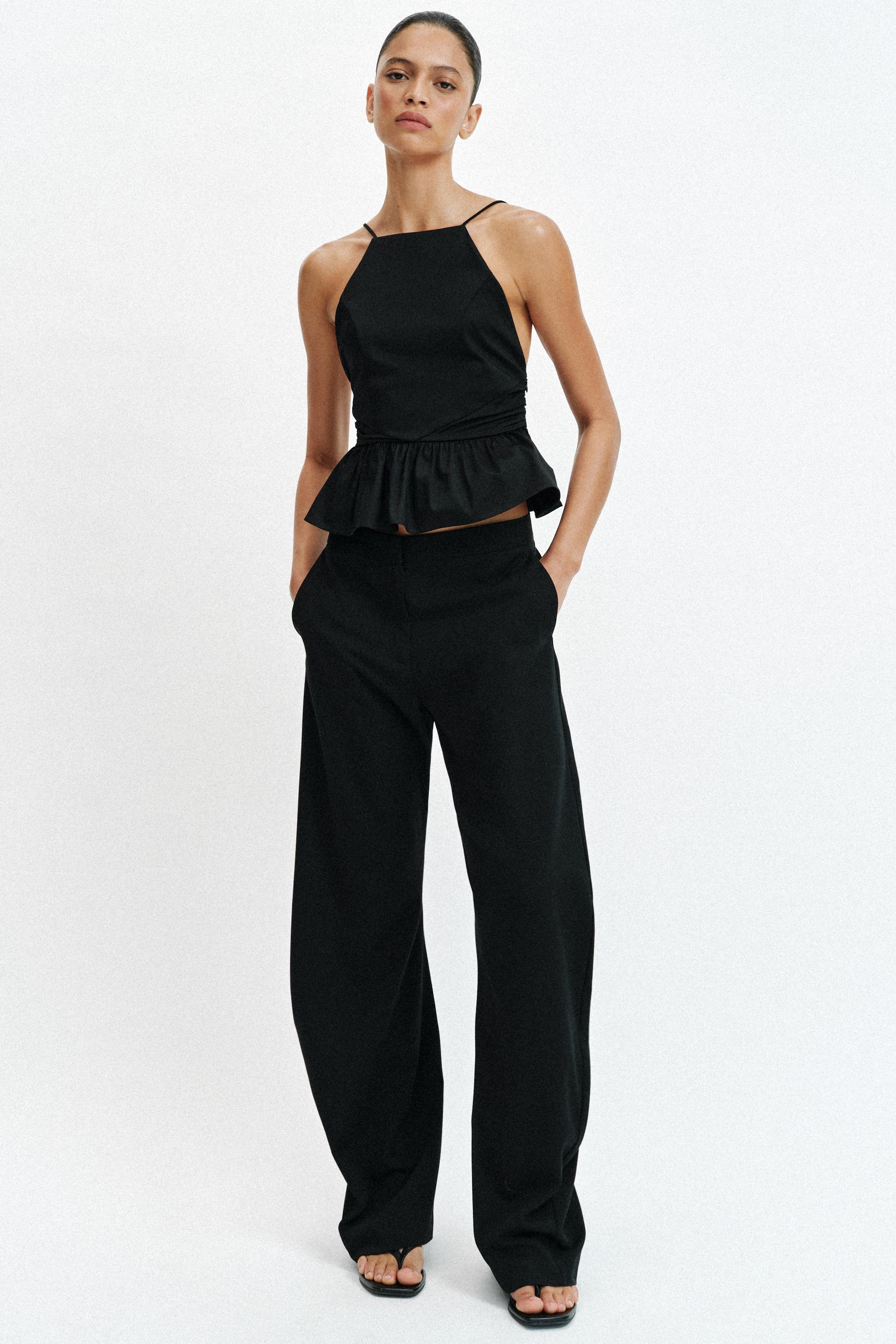 PEPLUM HALTER TOP